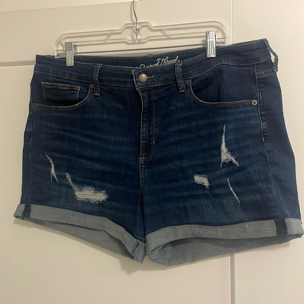 Universal thread distressed dark blue denim jean shorts.